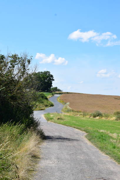istock country road up the hill 2170232445