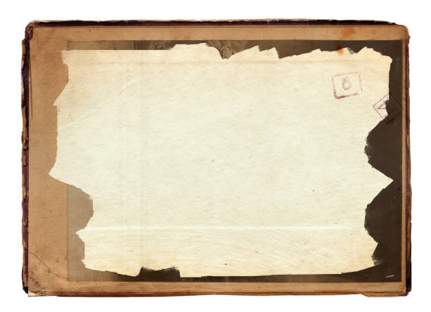 istock Vintage background of old ancient torn paper texture isolated 2170233898
