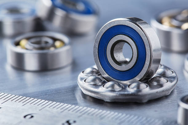 istock different bearings on a metal background. Part of mechanism. 2170235510