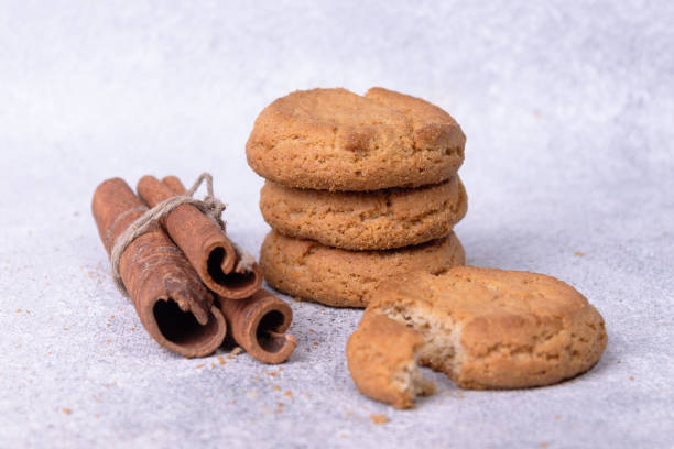 istock round oatmeal cookies with cinnamon on a white table 2170236152