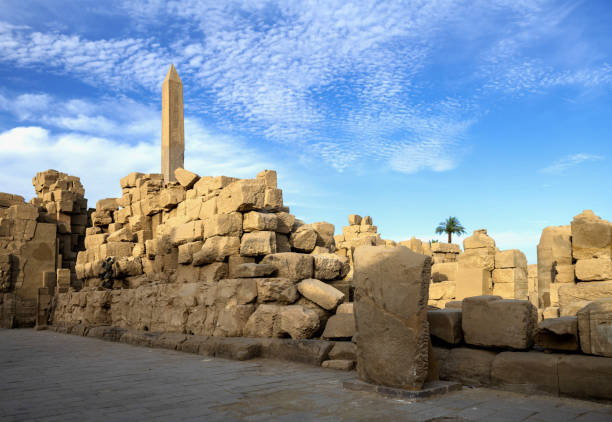Luxor, Egypt, April 14, 2023: View of the ruins of the Karnak Temple with its obelisk on a sunny afternoon.