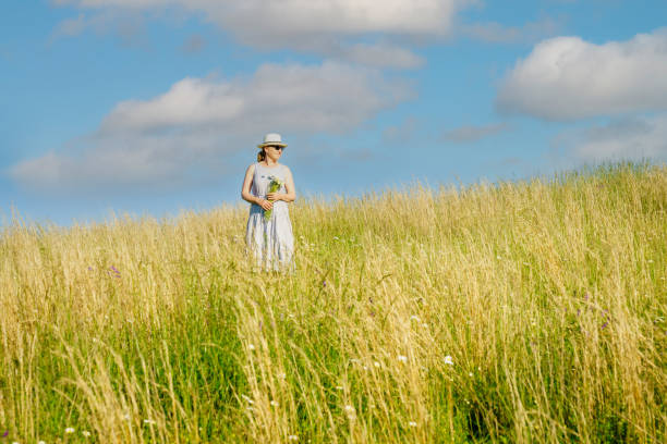 Free Stock Photo of Woman Standing in Field of Tall Grass | Download ...