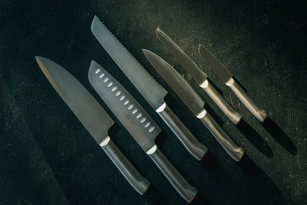 istock Casting steel various chef knife, Set of modern sharp kitchen knives on dark background 2170238392
