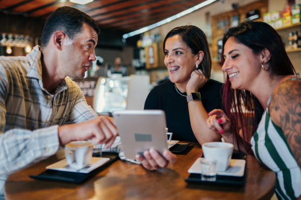 istock Group of friends having conversations in a coffee shop 2170241709