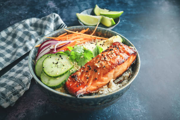 istock Spicy Salmon Bowl with Rice, Carrots, Cucumber and Avocado 2170242862