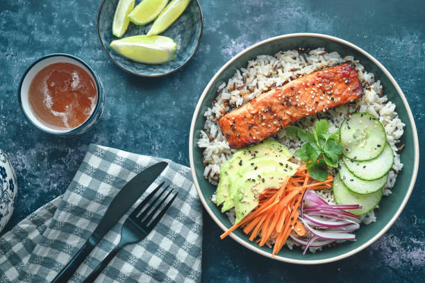 istock Spicy Salmon Bowl with Rice, Carrots, Cucumber and Avocado 2170242864
