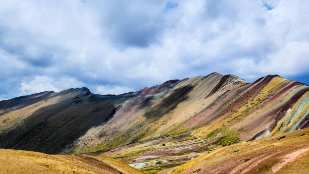 istock Rainbow Mountain in the Shadows of the Clouds 2170243864