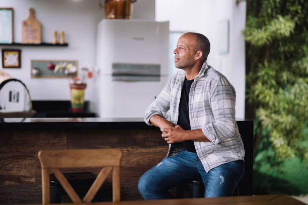 istock Mid adult man sitting and relaxing 2170245539