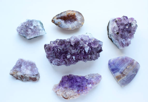 istock Multicolored healing chakra crystals.   Real semi-precious stones: amethyst and  fluorite. 2170245862