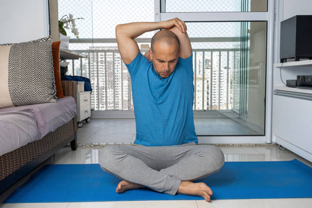 istock 48 year old Brazilian man practicing yoga at his home_4. 2170246581