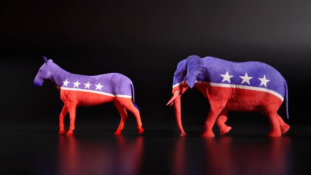 istock Republicans and Democrats walk a line on Black Background. US presidental elections. 2170249985