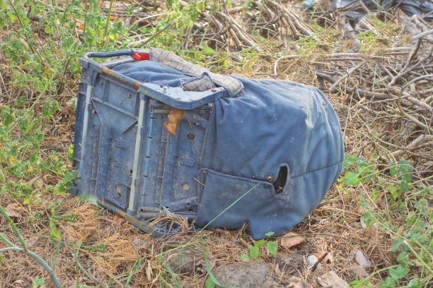 istock one old blue broken baby carriage lies on the ground 2170257022
