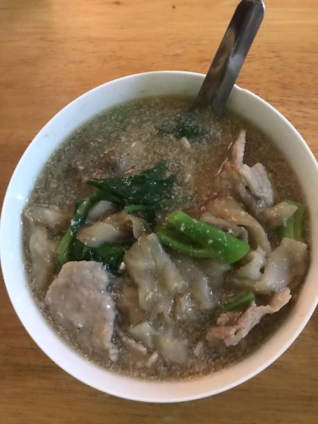 istock Kale slice pork noodles with gravy soup 2170262475