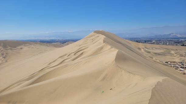 istock Sand dunes desert city Peru 2170266458