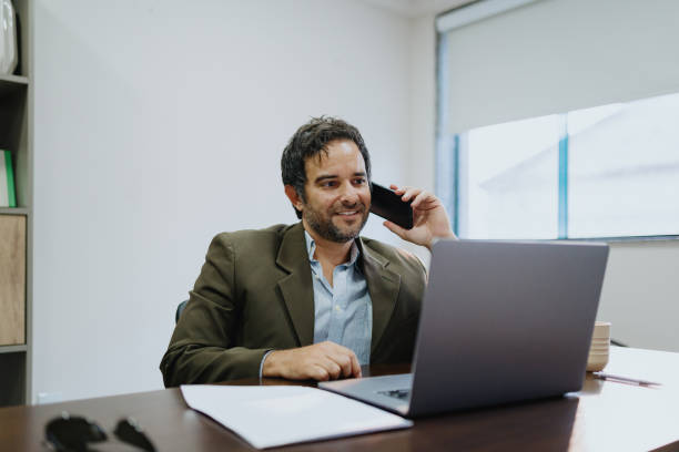 istock Businessman on the phone in the office 2170267523
