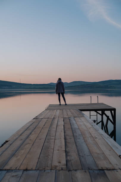 istock Woman on the pier 2170267880