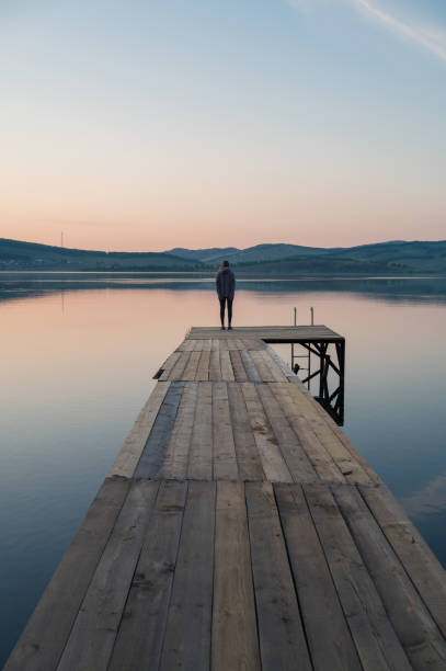 istock Woman on the pier 2170267890