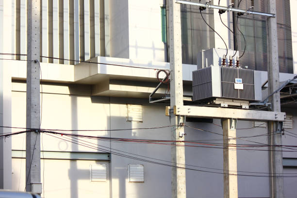 istock electrical transformer install on pole supply power to building 2170284003