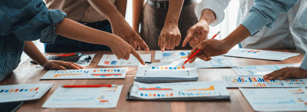 istock Analyst team utilizing BI Fintech to analyze financial dashboard. Scrutinize 2170288810