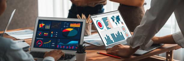 istock Analyst team utilizing BI Fintech to analyze financial report. Scrutinize 2170289124
