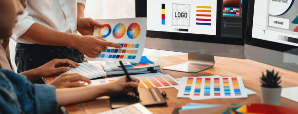istock Graphic designer works on computer laptop with digital pen. Scrutinize 2170289740
