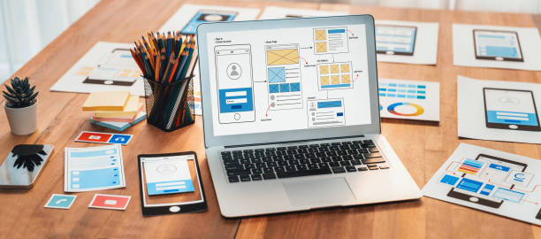 istock Digital wireframe design for web or mobile app UI on laptop. Scrutinize 2170290226