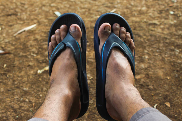 istock brown skin asian man wearing sandals 2170291996