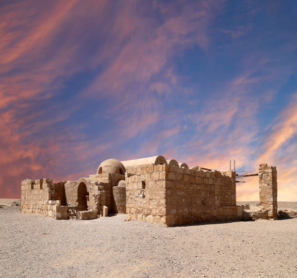 Quseir (Qasr) Amra desert castle (against the sky with clouds) near Amman, Jordan. World heritage with famous fresco's. Built in 8th century,  of early Islamic art and architecture