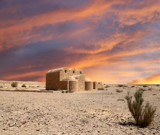 istock Quseir (Qasr) Amra desert castle (against the sky with clouds) near Amman, Jordan 2170297321