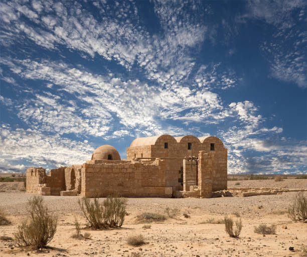 istock Quseir (Qasr) Amra desert castle (against the sky with clouds) near Amman, Jordan 2170297338