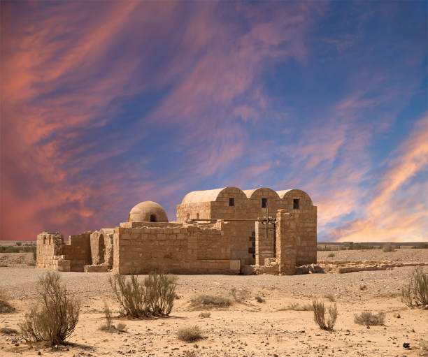 istock Quseir (Qasr) Amra desert castle (against the sky with clouds) near Amman, Jordan 2170297339