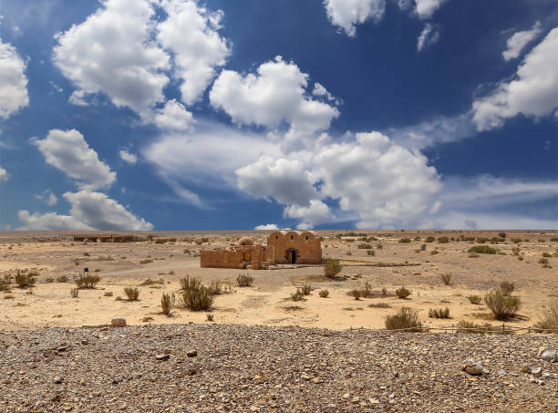 istock Quseir (Qasr) Amra desert castle (against the sky with clouds) near Amman, Jordan 2170297427
