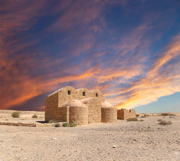 istock Quseir (Qasr) Amra desert castle (against the sky with clouds) near Amman, Jordan 2170297450