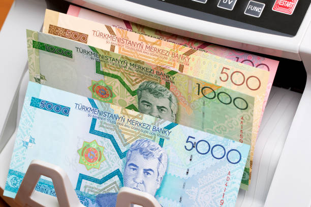 istock Turkmenistani manat in the counting machine 2170302549