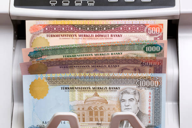 istock Turkmenistani manat in the counting machine 2170302670