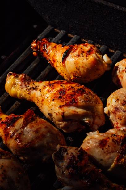 istock Chicken legs on outdoor grill. 2170302781