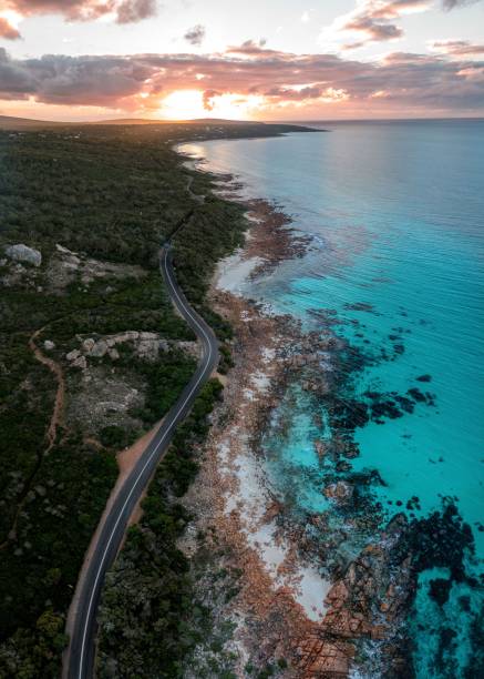 istock A coastal road along a rocky shoreline 2170303124