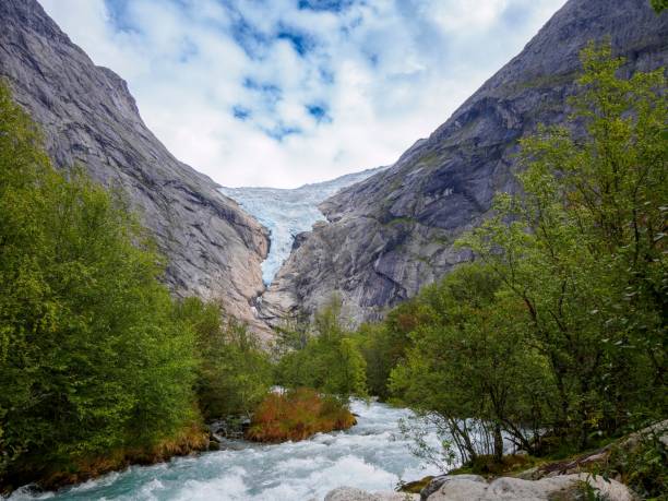 istock Glacier and River in Mountain Valley 2170303945