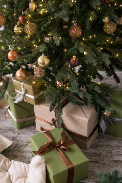 istock Bronze balls on the Christmas tree close-up. Christmas tree design decorations. The concept of celebrating New Year and Christmas 2170304891