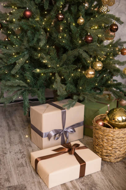 istock Bronze balls on the Christmas tree close-up. Christmas tree design decorations. The concept of celebrating New Year and Christmas 2170304900
