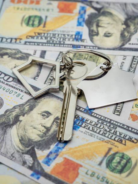 istock House keys on hundred-dollar bills 2170305642