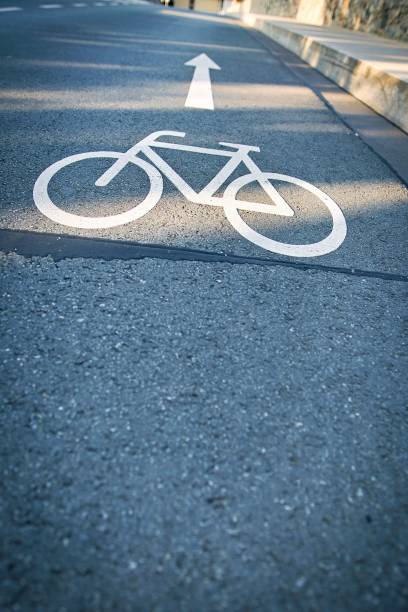 istock Bicycle lane symbol on urban street 2170307702