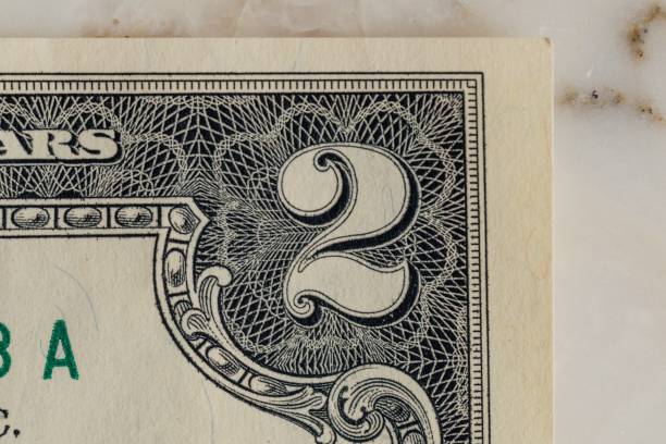close up of 2 on american two dollar bill
