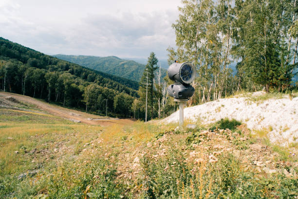 Snow cannon on the ski slope in summer. High quality photo