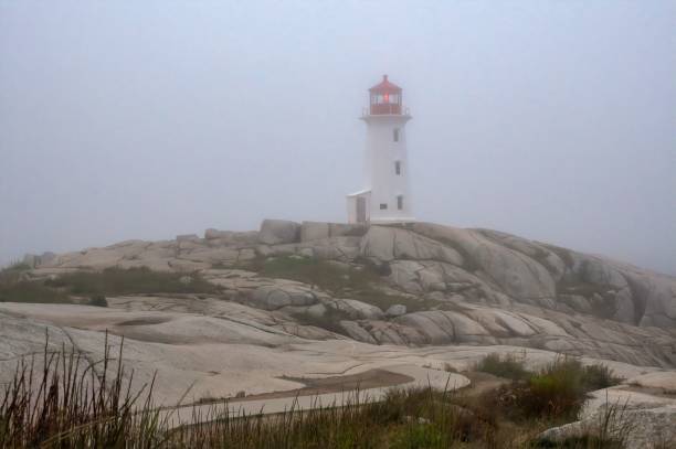 istock Foggy lighthouse at Peggy's Cove, Nova Scotia. 2170313876