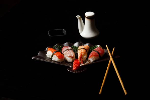 istock Sashimi sushi set on a black wooden board 2170317648