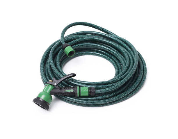 istock Green garden hose isolated on white background 2170322611