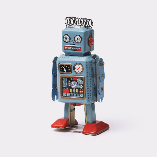 istock Funny vintage tin toy robot on white background 2170324022