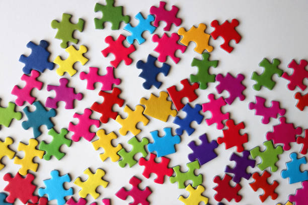 istock Colorful Jigsaw Puzzle Pieces 2170325940