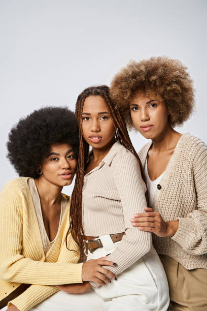 istock Celebrating friendship and diversity among three joyful women in a stylish studio setting 2170327472